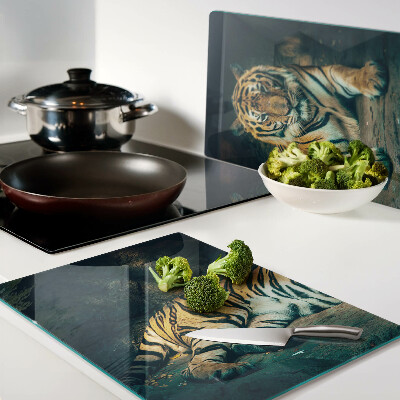 Glass cutting board A tiger lying on the rocks