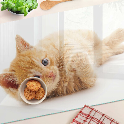 Glass kitchen board Ginger kitten on a white background
