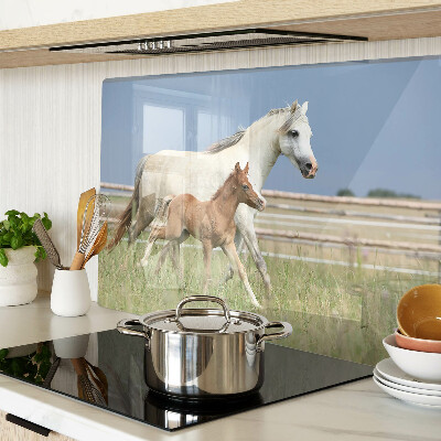 Glass chopping board A horse with a foal in a meadow