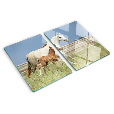 Glass chopping board A horse with a foal in a meadow