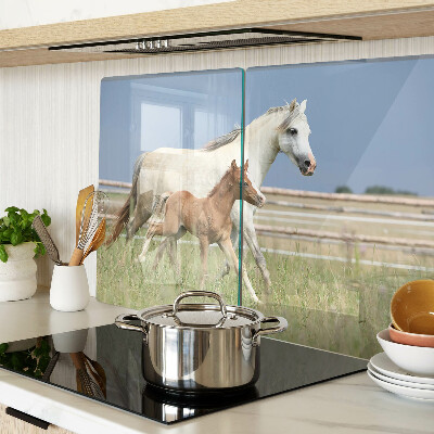 Glass chopping board A horse with a foal in a meadow