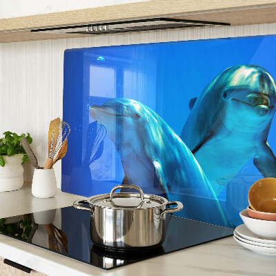 Glass kitchen board Dolphins in the water