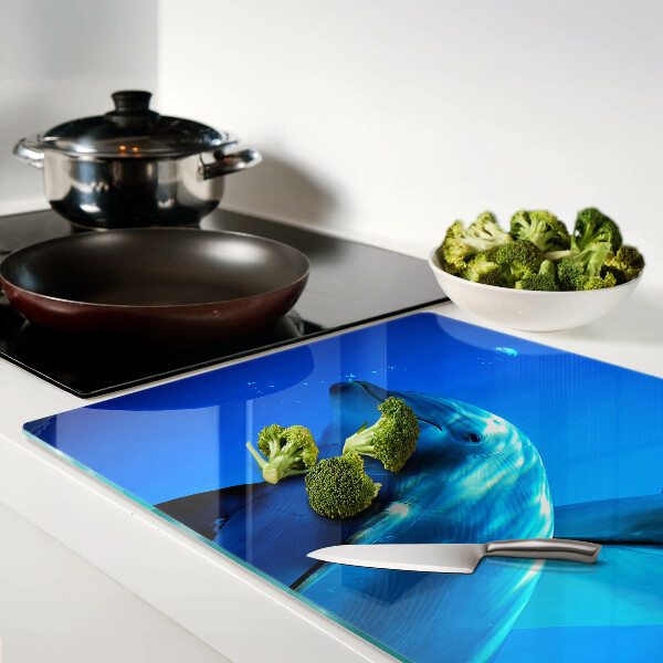 Glass kitchen board Dolphins in the water