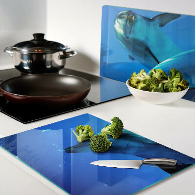 Glass kitchen board Dolphins in the water