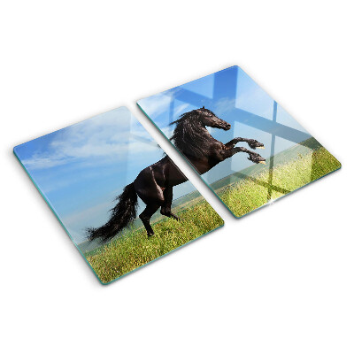 Glass cutting board Black horse in the meadow