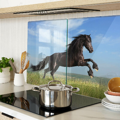 Glass cutting board Black horse in the meadow