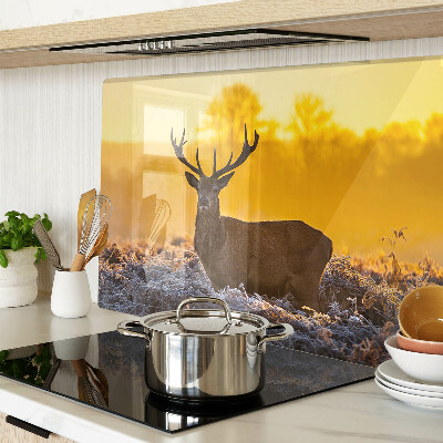 Cutting board A deer against the background of a morning landscape