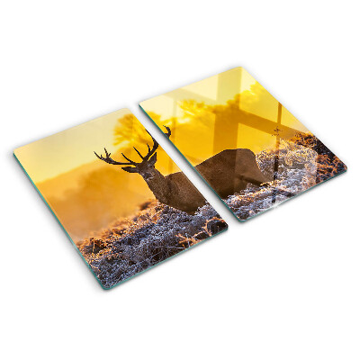 Cutting board A deer against the background of a morning landscape