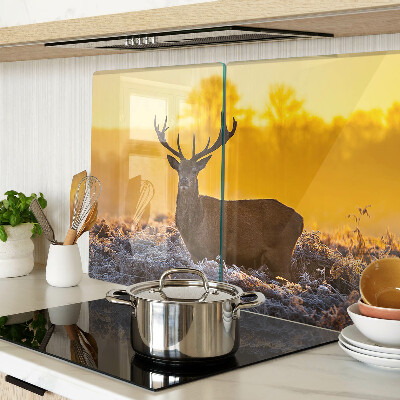 Cutting board A deer against the background of a morning landscape
