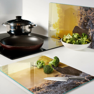 Cutting board A deer against the background of a morning landscape