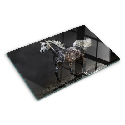 Glass cutting board A spotted horse on the run