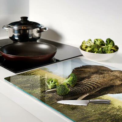 Glass kitchen board An elephant against the backdrop of the African savannah