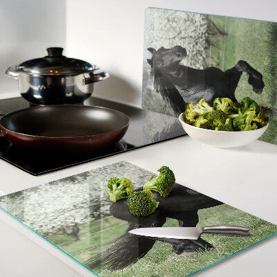 Chopping board Black horse in the meadow