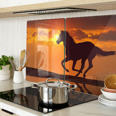 Cutting board A horse against the backdrop of the setting sun