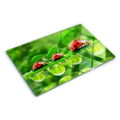 Chopping board Ladybugs on leaves with water drops