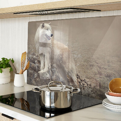 Glass kitchen board Wolf on a rocky mountain