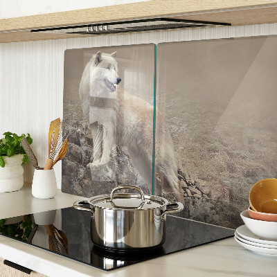 Glass kitchen board Wolf on a rocky mountain