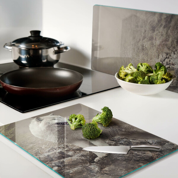 Glass kitchen board Wolf on a rocky mountain
