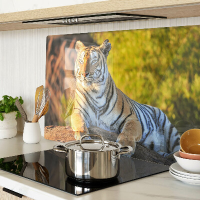 Chopping board glass Tiger against the background of nature
