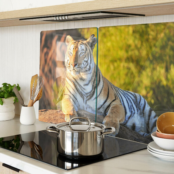 Chopping board glass Tiger against the background of nature