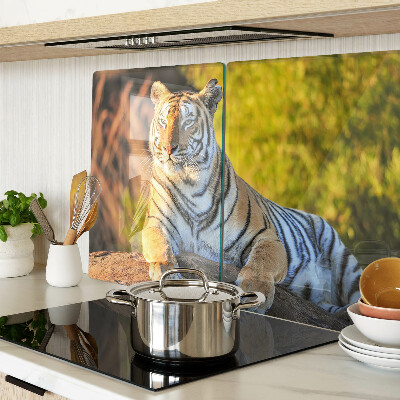 Chopping board glass Tiger against the background of nature