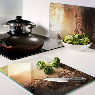 Glass chopping board Deer against the sunset background
