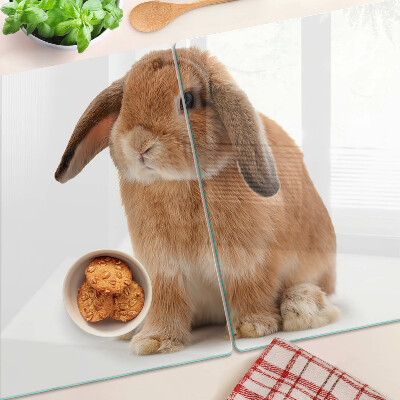 Glass cutting board Rabbit on a white background