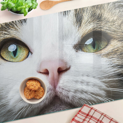 Glass cutting board A cat with green eyes