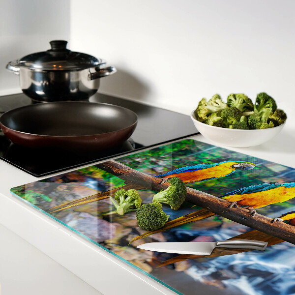 Chopping board Parrots on a branch in a tropical forest