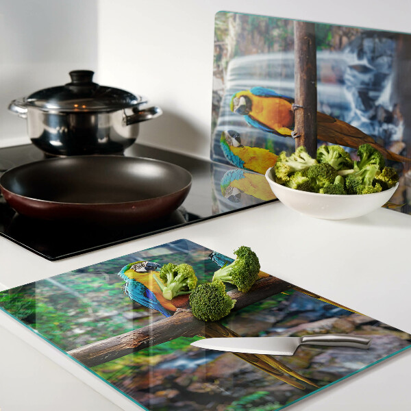 Chopping board Parrots on a branch in a tropical forest