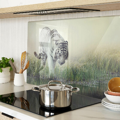 Glass kitchen board Tiger in the grass