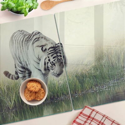 Glass kitchen board Tiger in the grass