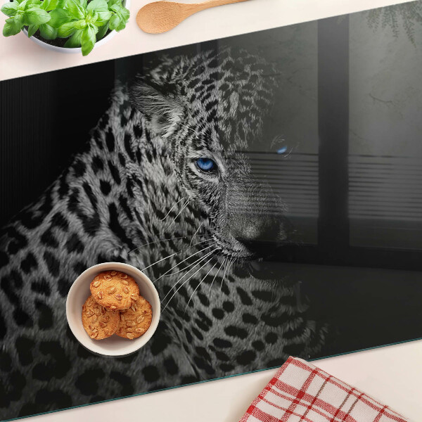 Chopping board glass Left panther with blue eyes