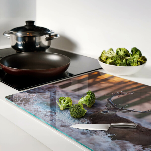 Chopping board glass Deer in the winter forest