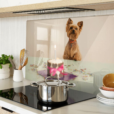 Glass chopping board A dog at the table with a cake