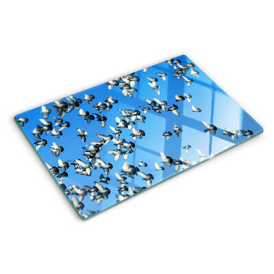 Chopping board Pigeons flying in the sky