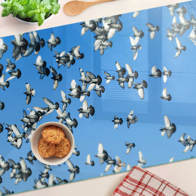 Chopping board Pigeons flying in the sky