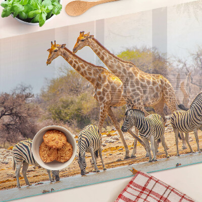 Chopping board glass Zebra and giraffe in their natural habitat