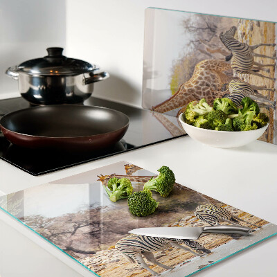 Chopping board glass Zebra and giraffe in their natural habitat