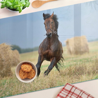 Cutting board A horse in the meadow