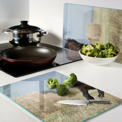 Cutting board A horse in the meadow
