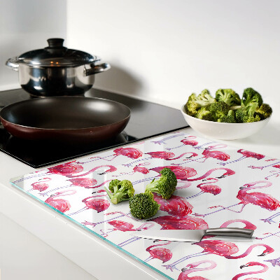 Glass kitchen board Flamingos on a white background