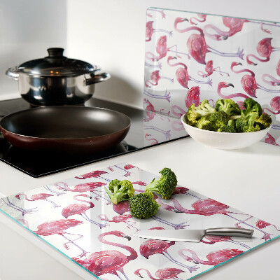 Glass kitchen board Flamingos on a white background