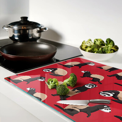 Glass cutting board Ferrets on a red background