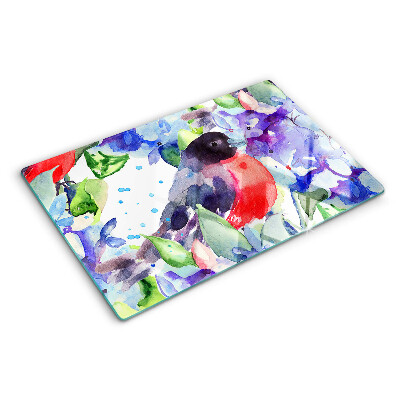 Chopping board glass A bird against a background of flowers