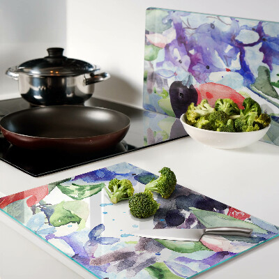 Chopping board glass A bird against a background of flowers