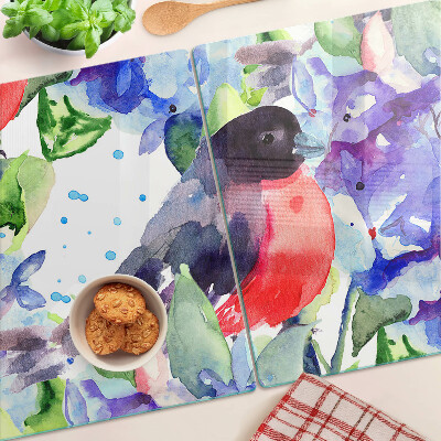 Chopping board glass A bird against a background of flowers