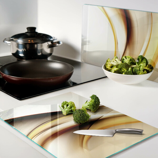 Glass chopping board Abstract waves in shades of gold