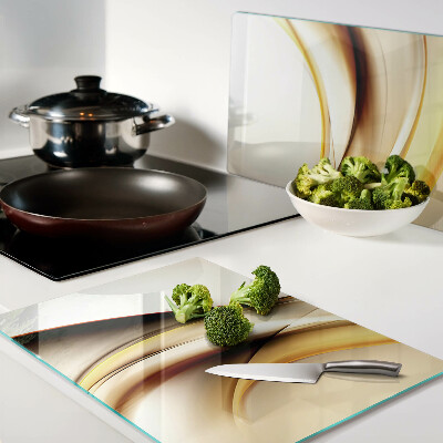 Glass chopping board Abstract waves in shades of gold