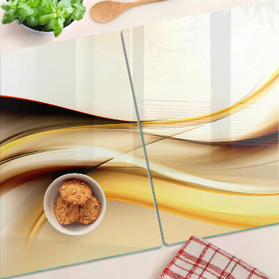 Glass chopping board Abstract waves in shades of gold